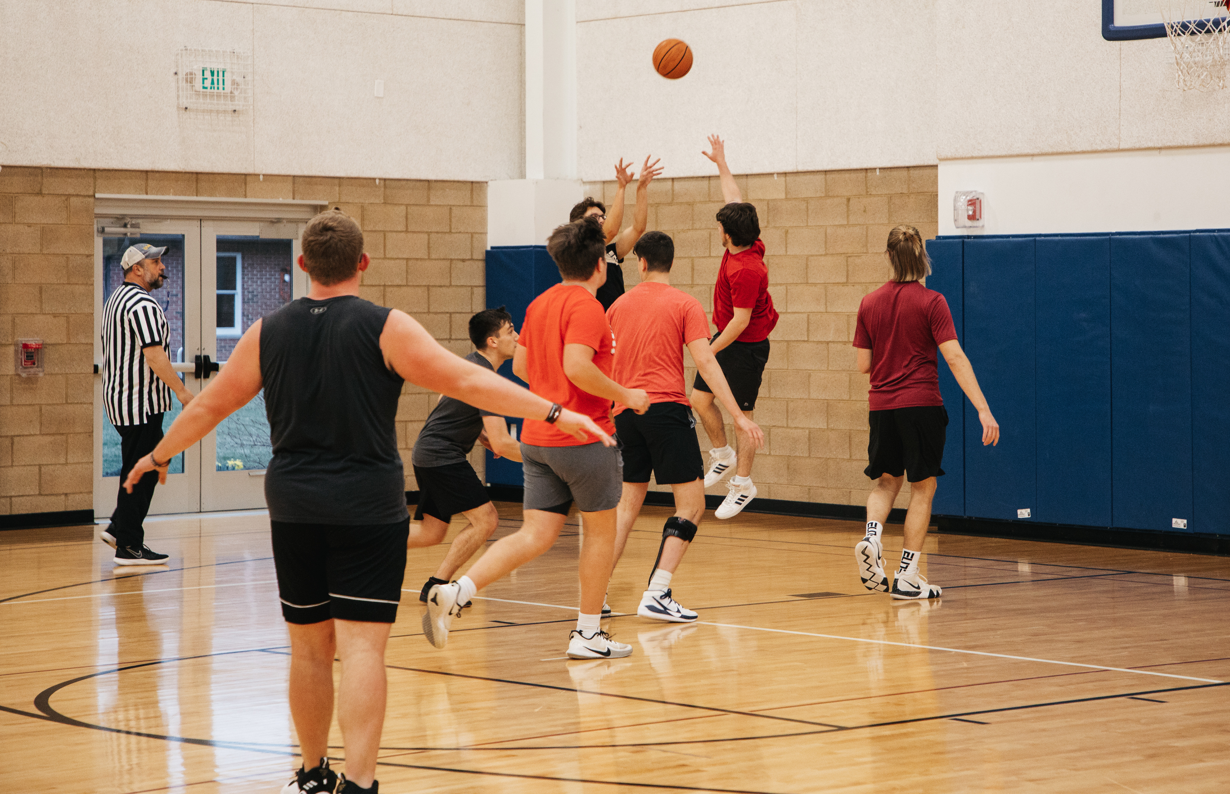 A group of students playing basketball