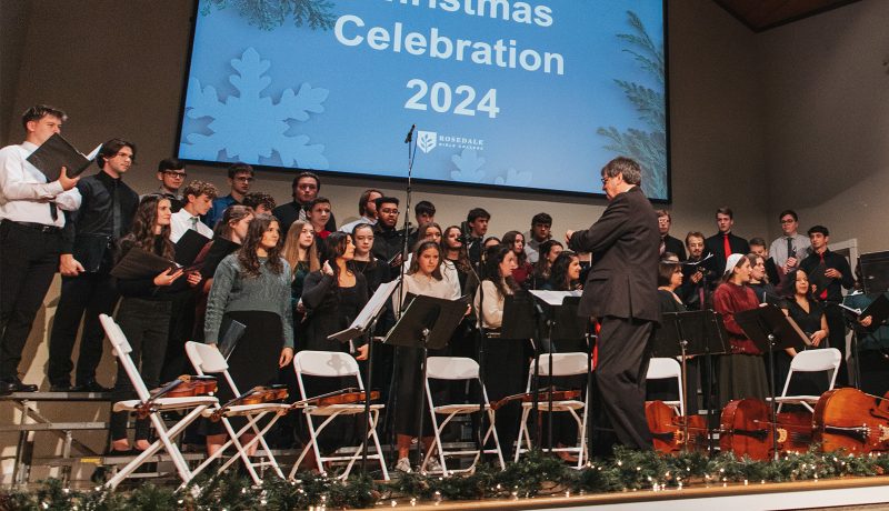 The RBC choir sings on the chapel stage during the Christmas Celebration